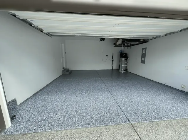 Seattle-area garage with a harbor blue flake floor coating