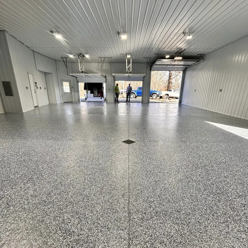 After: full-flake floor in a large shop garage