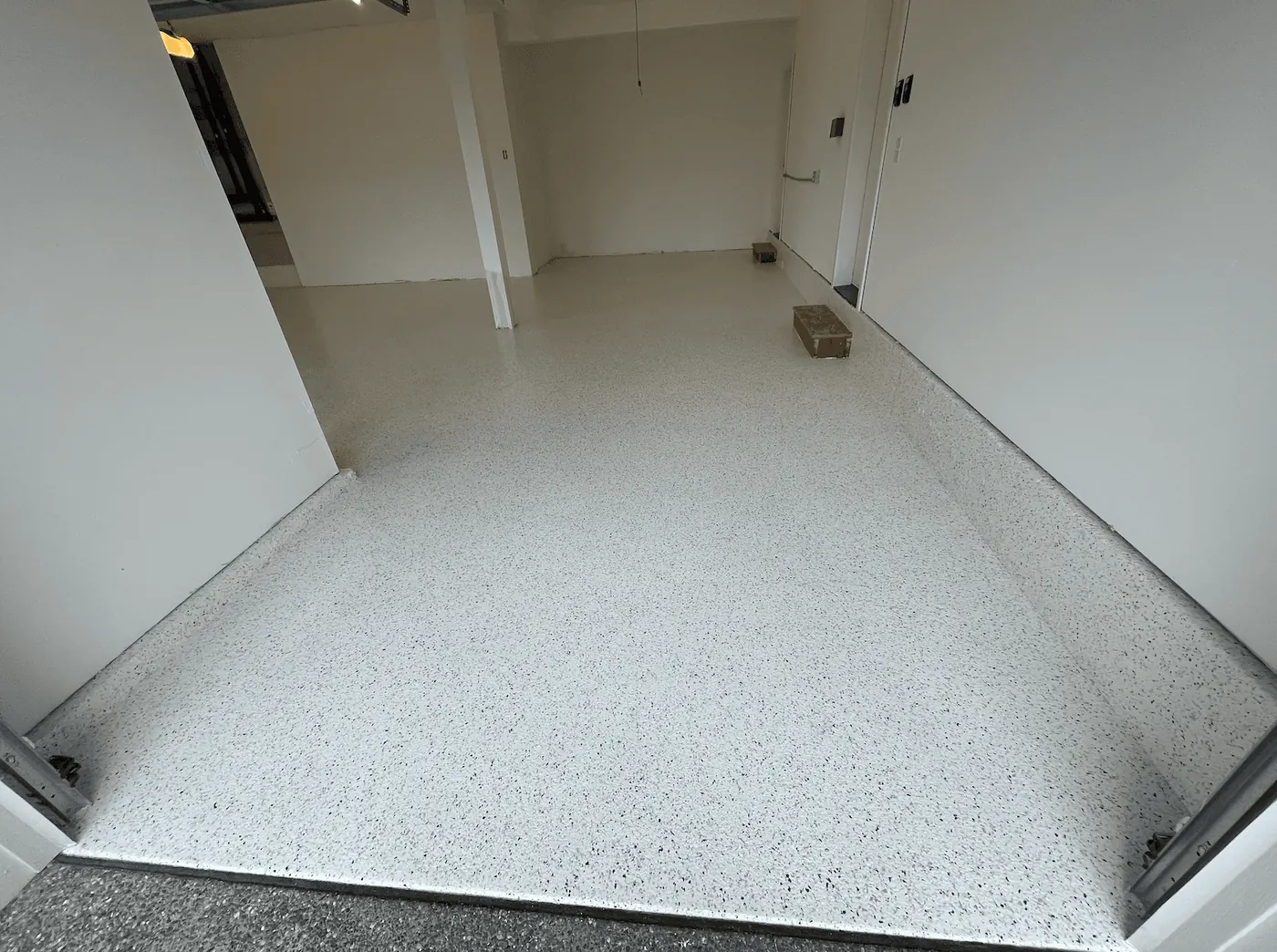 Seattle-area garage with an alabaster flake floor coating