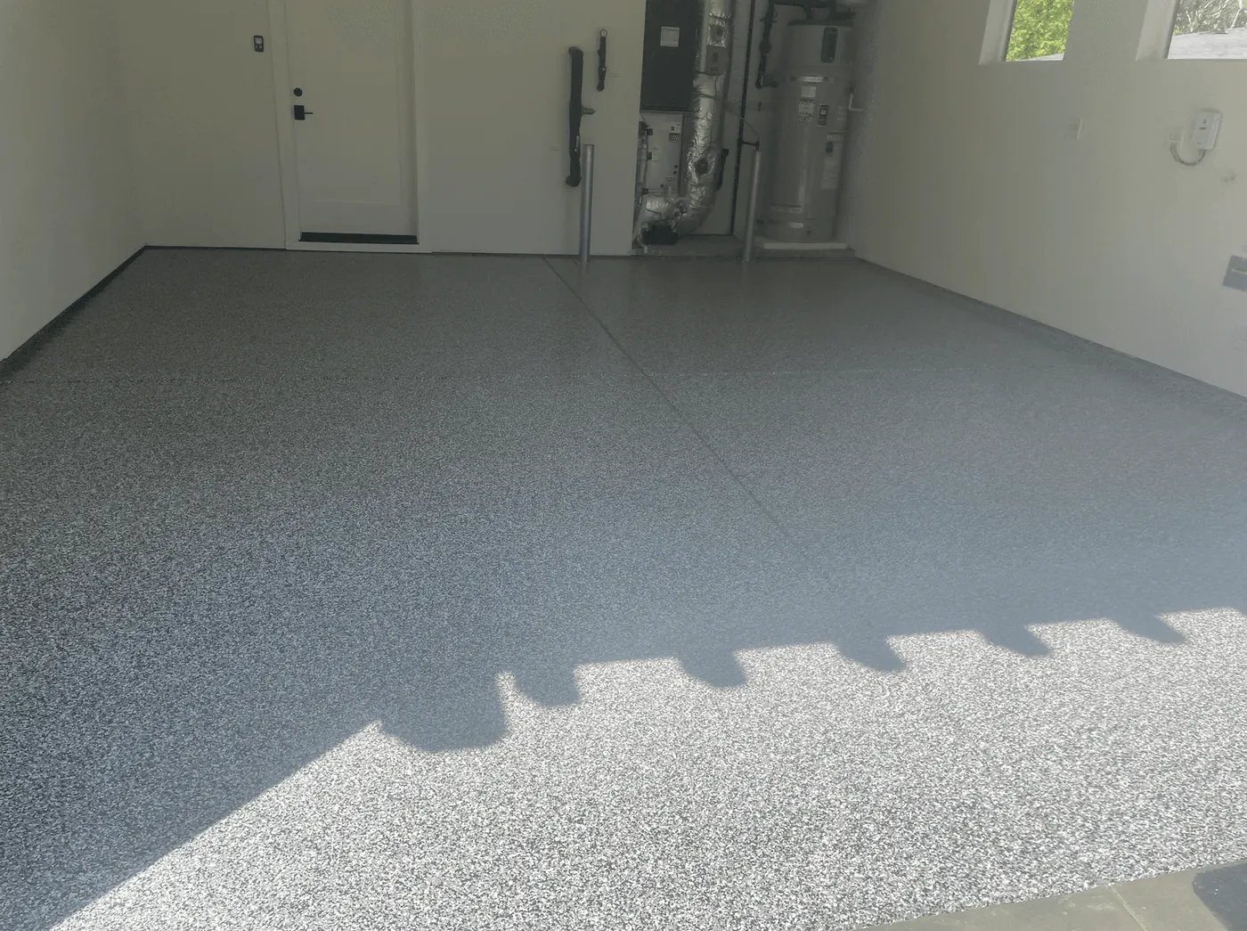Seattle-area garage with a nickel flake floor coating