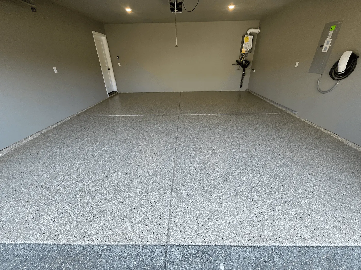 Seattle-area garage with a stone gray flake floor coating