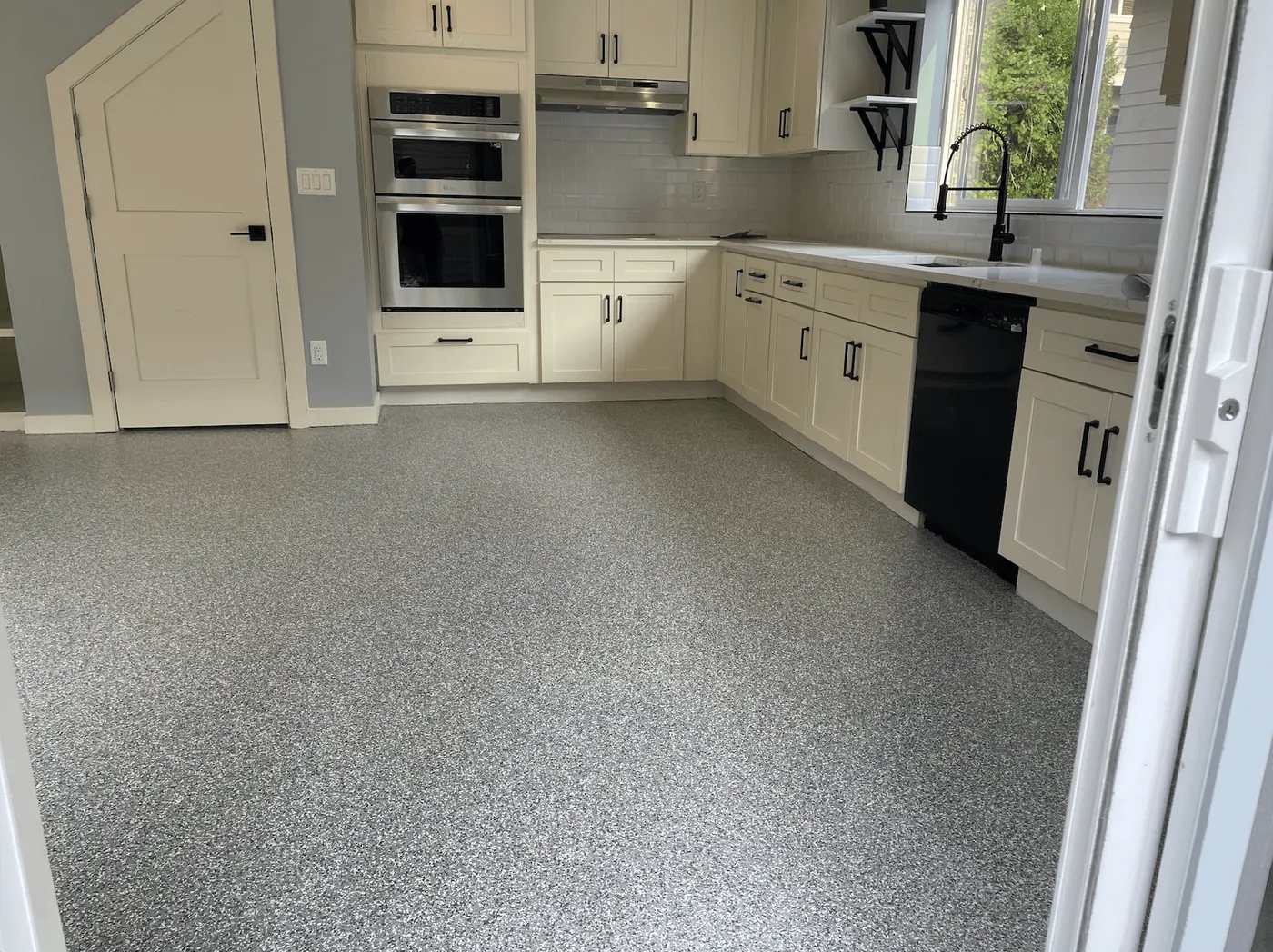 Seattle-area kitchen with a gray flake floor coating