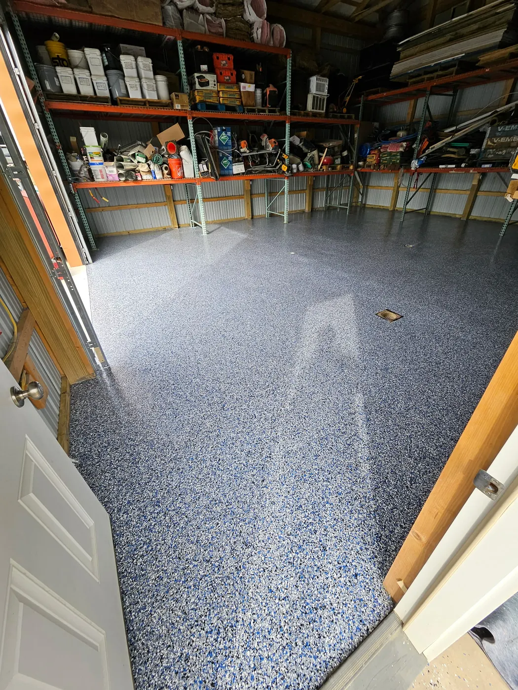 Detached shop garage floor with pewter flake coating