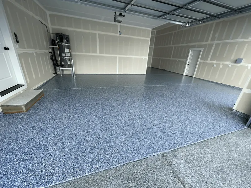 Seattle-area garage with an indigo flake floor coating