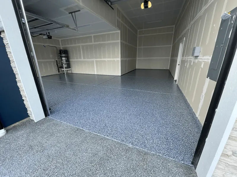 Garage with a midnight blue flake floor coating