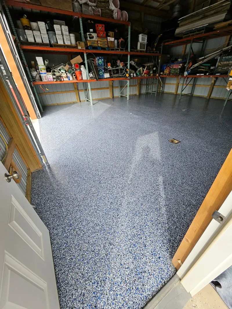 Detached shop garage floor with pewter flake coating