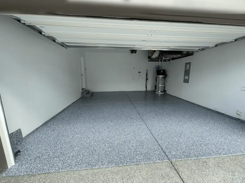 Garage with a harbor blue flake floor coating